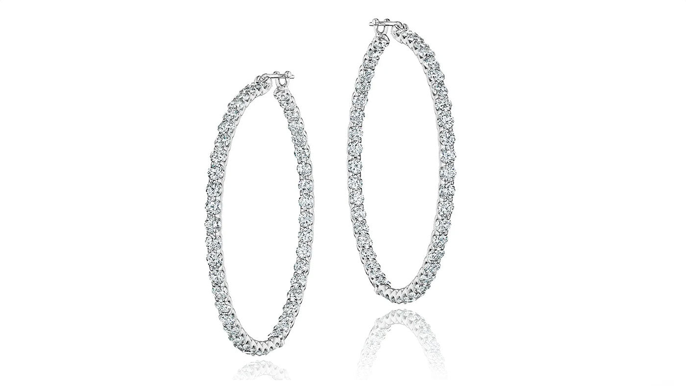 Platinum and diamond hoop earrings made in Chicago by jeweler Lester Lampert.