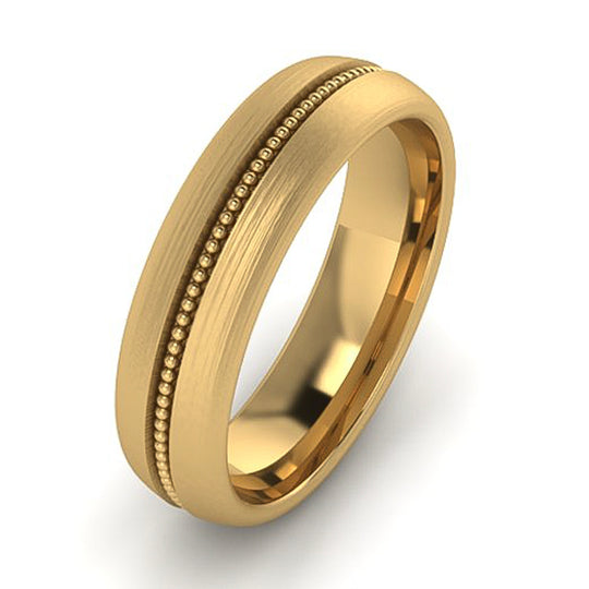 Beaded center gold men’s wedding band with textured detail by Lester Lampert