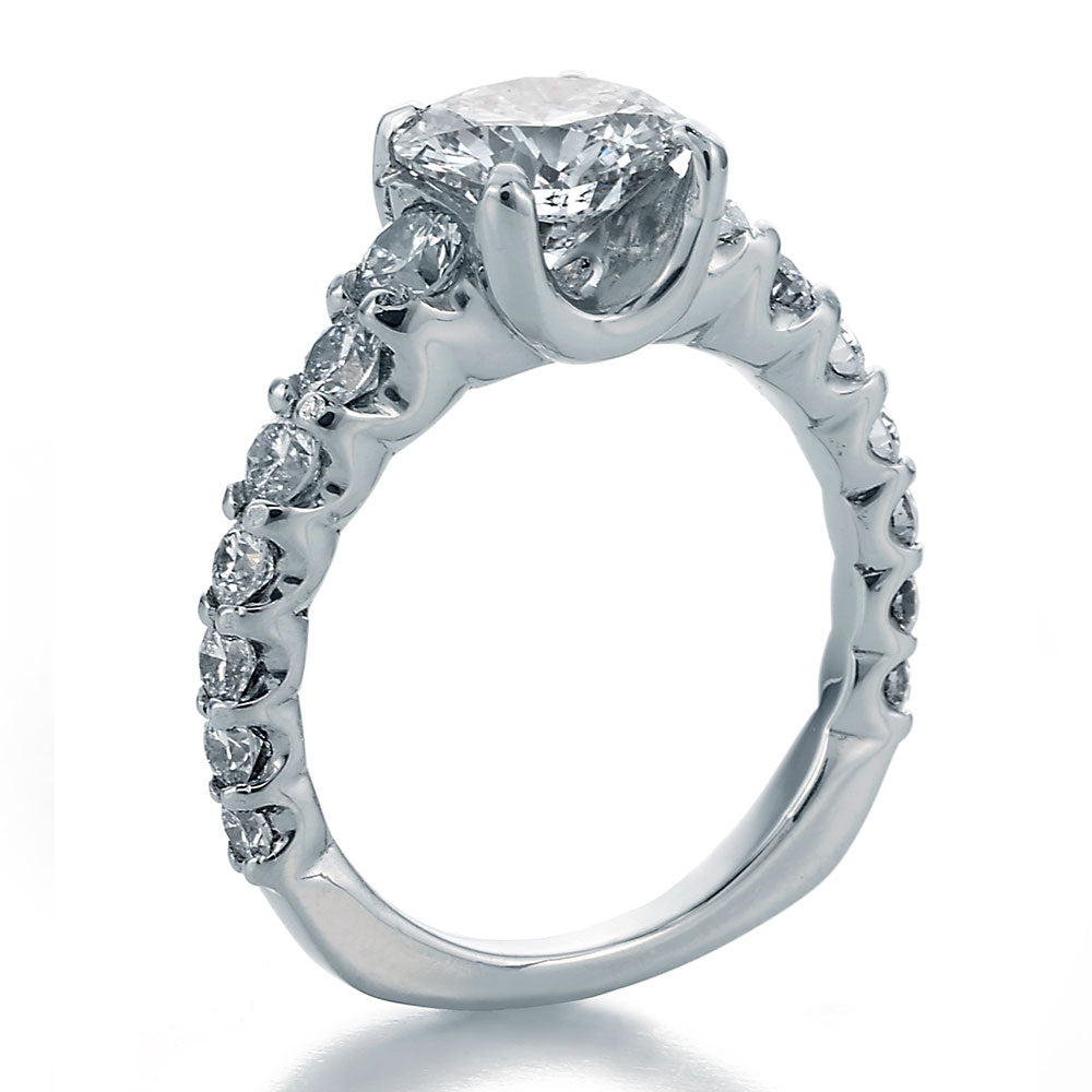 Side View Image of SkaLLop Engagement Ring with Round Center and Ideal Cut Round Diamonds with Textured Shank
