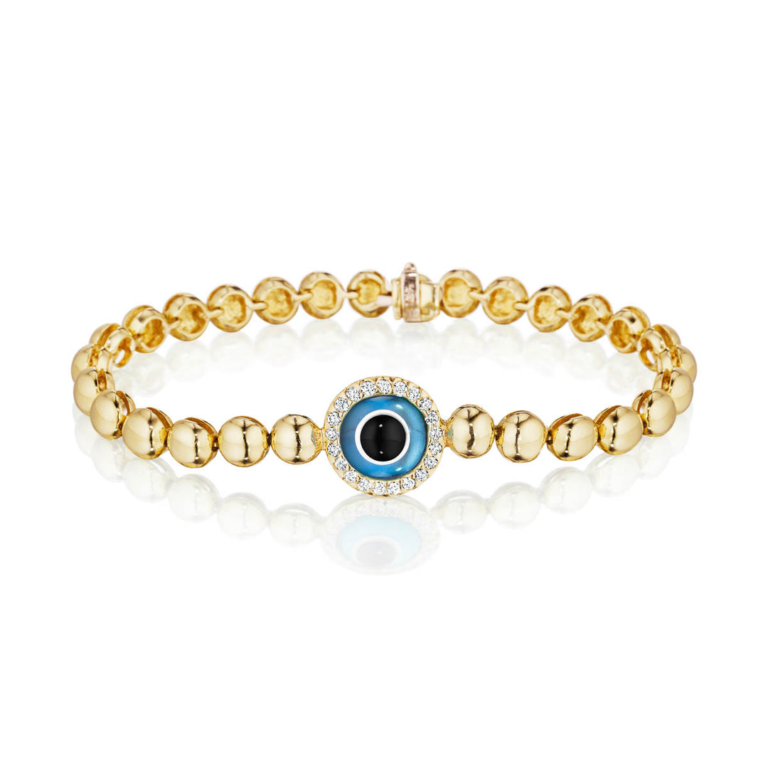 Blue topaz Eye of the Leopard Lucky Eye bracelet in 18k yellow gold with diamond halo, symbol of protection and fortune.