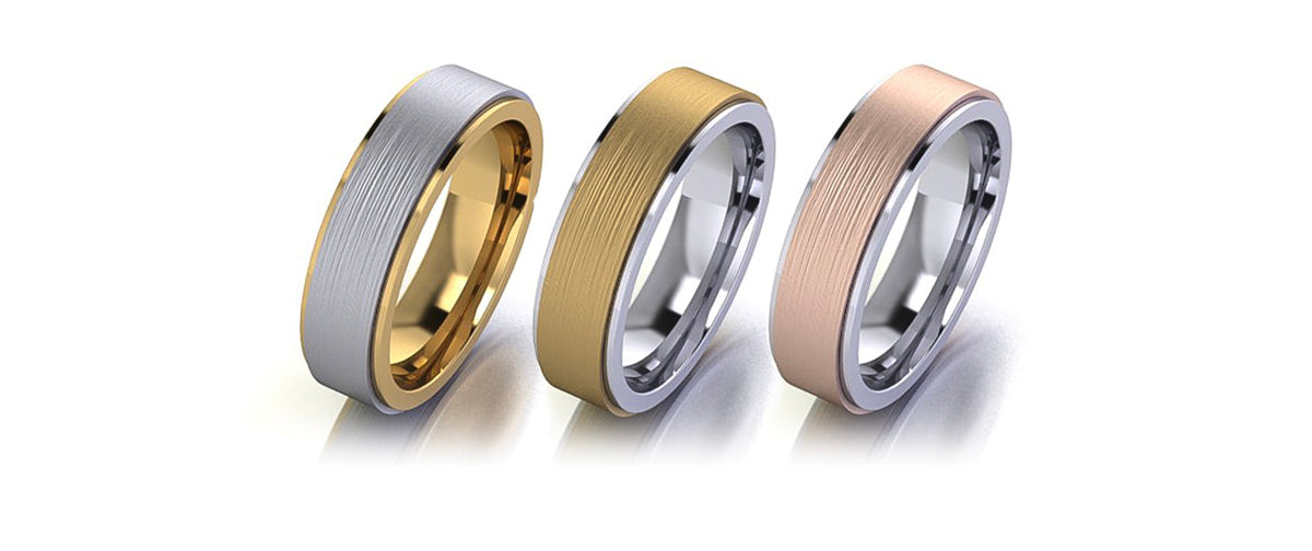 Mixed metal wedding band featuring gold and platinum by Chicago jewler, Lester Lampert.