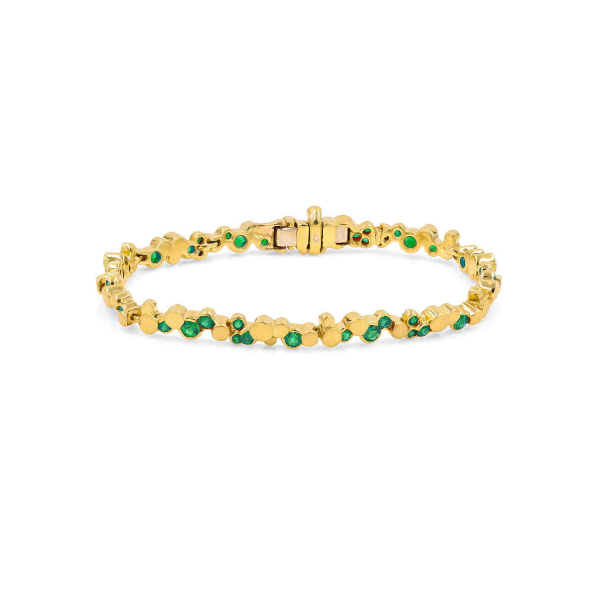 Gold and emerald handmade bracelet by chicago jeweler, Lester Lampert.