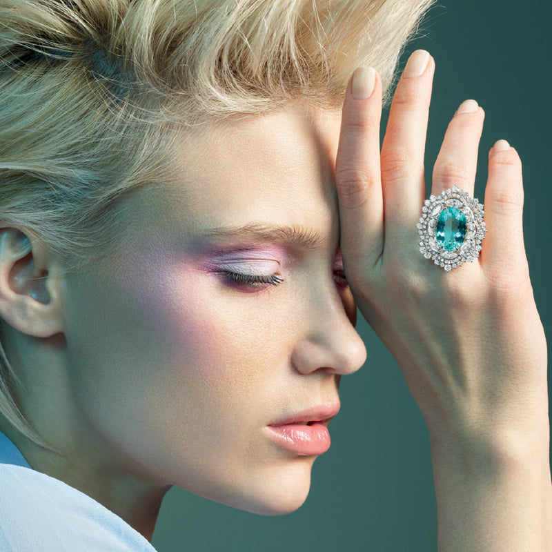 Sparkling emerald ring from Crivelli on model at Lester Lampert in Chicago