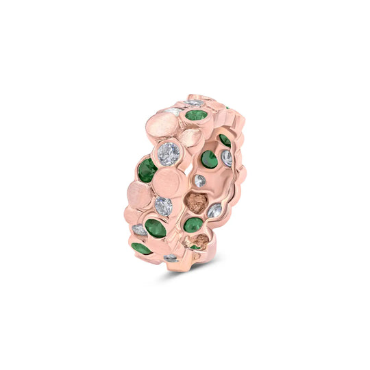 The BubbeLLes™ Ring by Lester Lampert in 18k rose gold, a custom diamond and emerald ring with a layered design, expertly crafted in Chicago.