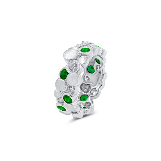 The BubbeLLes™ Ring by Lester Lampert in 18k white gold, a custom jewelry masterpiece featuring Ideal-cut diamonds and vivid emeralds, crafted in Chicago.