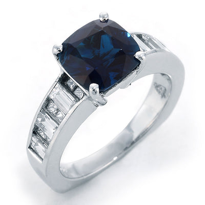 Diamond Ring With Blue Tourmaline and baguette cut diamonds