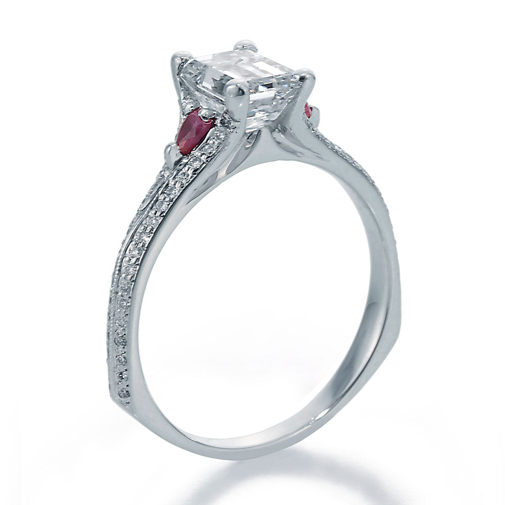 Side View Image of Emerald Cut Center Diamond with Pear Shape Rubies and Ideal Cut Round Diamond Accents Engagement Ring