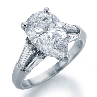 Image of Pear Shape Center Diamond and Tapered Baguette Cut Diamonds Engagement Ring