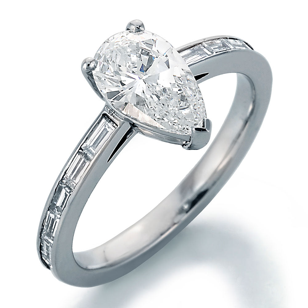 Image of Pear Shape Center Diamond and Baguette Cut Diamonds Engagement Ring
