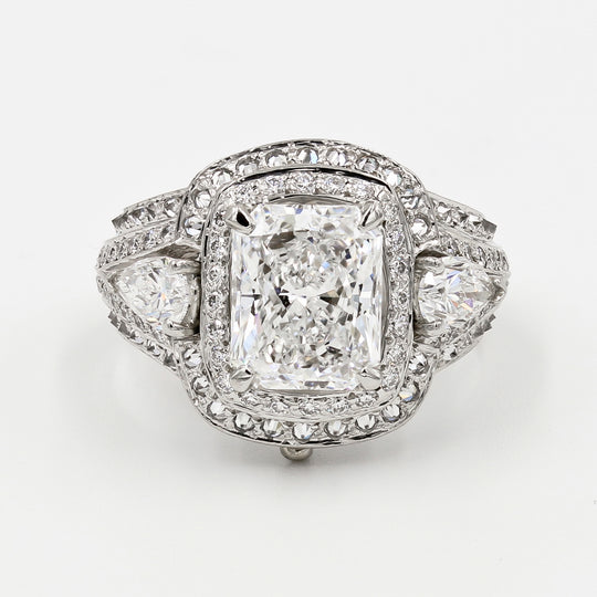 Image of Radiant Cut Diamond and Platinum Ring with Interchangable Side Stones