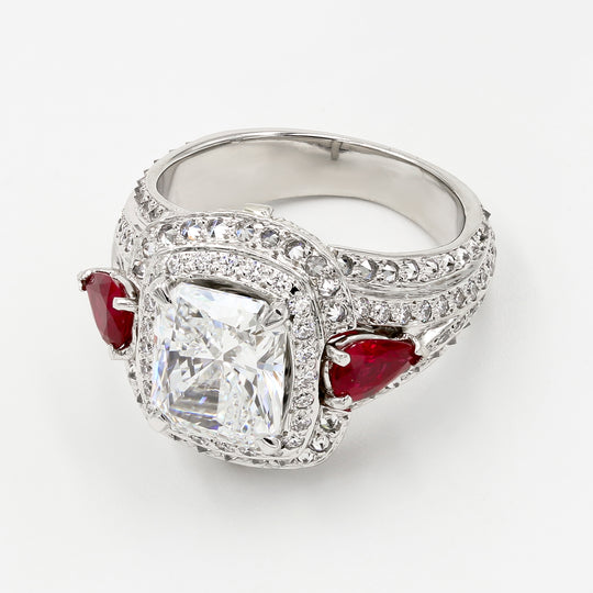 Platinum Ring With Radiant Cut Diamonds and Red Stones